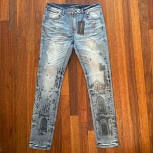 Men’s Sz 32” Slim Tapered Denim w/ Cathedral Print. Slight Stretch